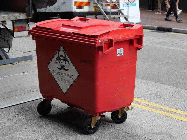 Red biohazard clinical waste bin