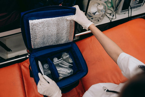 Paramedic with equipment bag