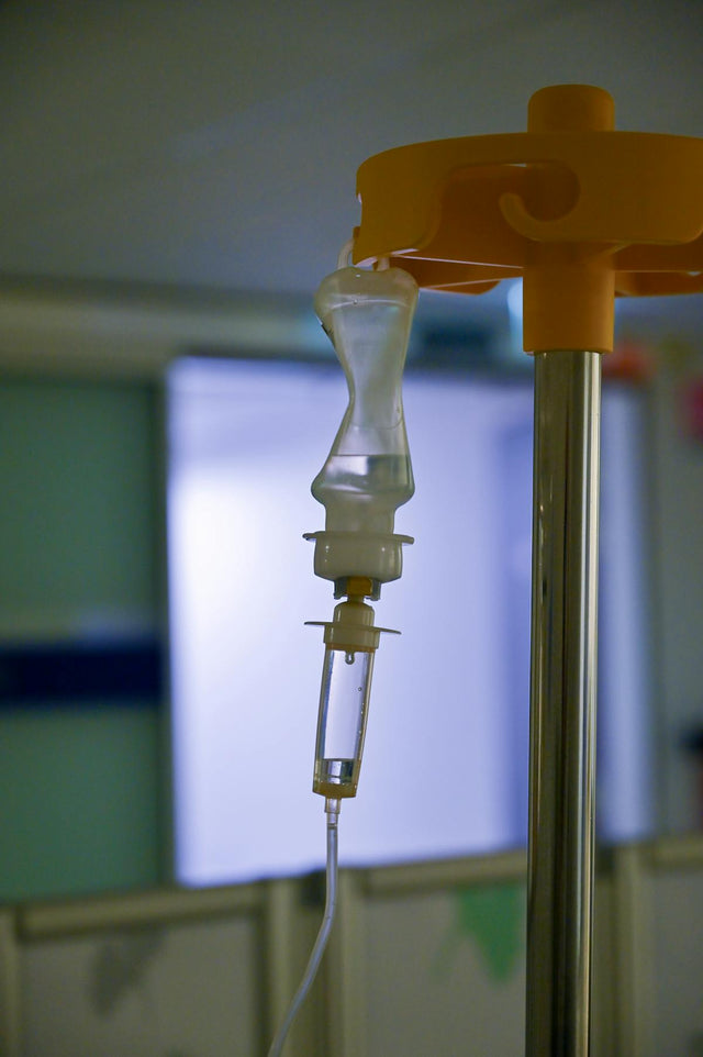 IV drip with hospital background