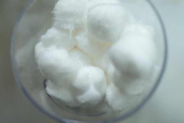 Cotton balls in glass container