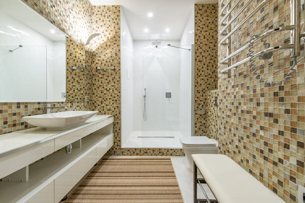 Bathroom with bench near shower