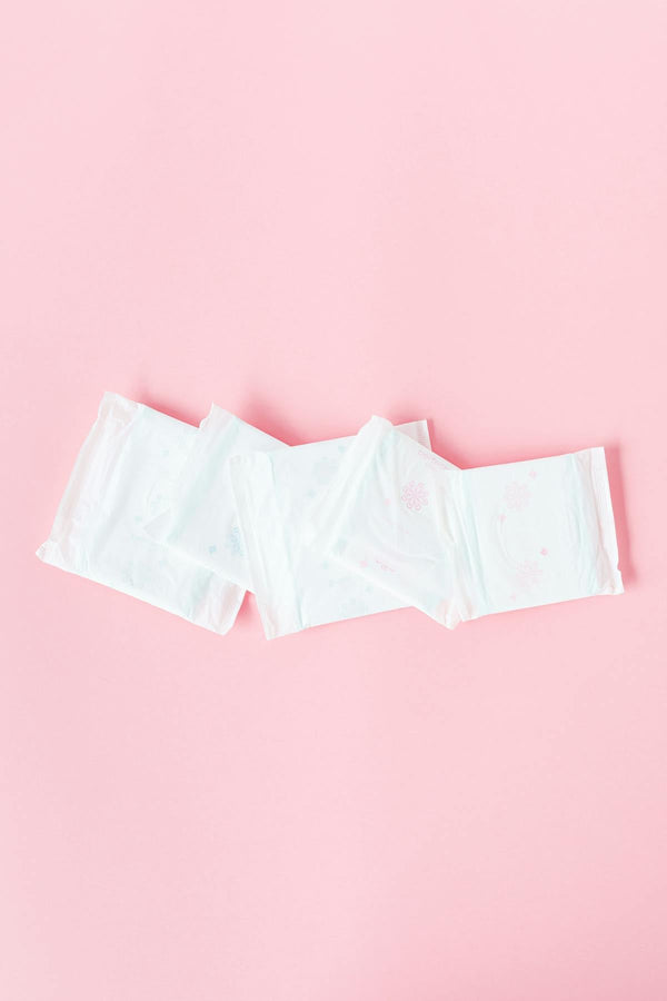 Incontinence pads on pink