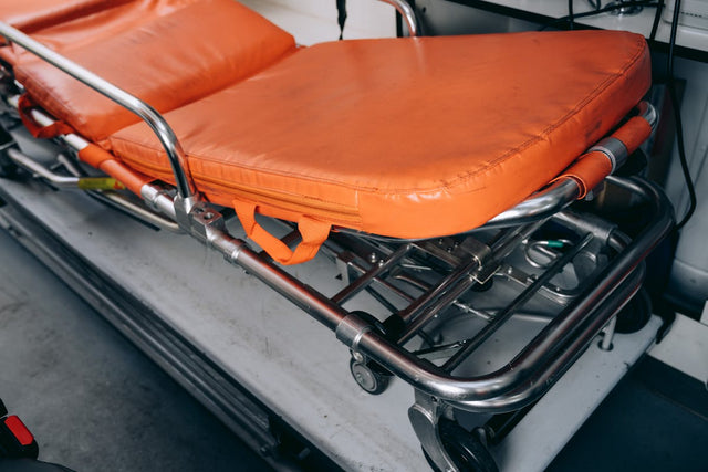 Emergency stretcher with orange padding