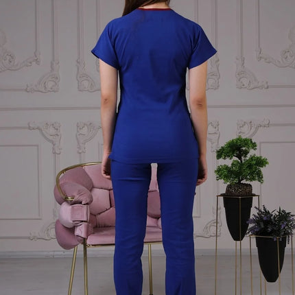 Saks Blauer Stretch-Arztanzug – Fledermausärmel